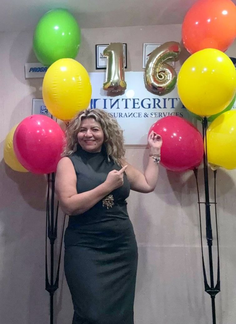 Roxana M. Nieto celebrating 16 years of Integrity Insurance & Services
